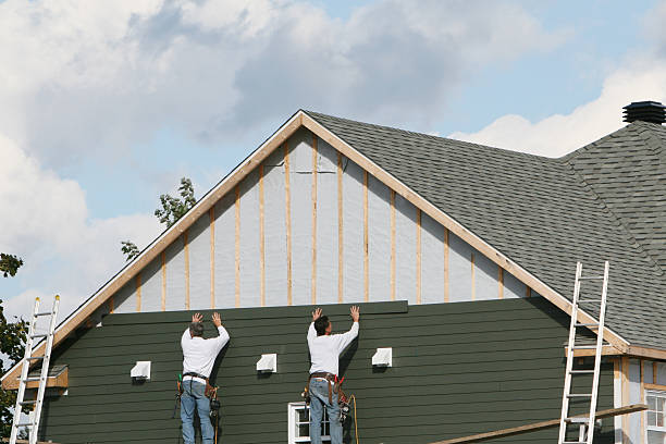 Professional Siding technician working in Armagh, PA